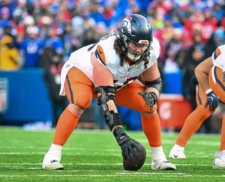 Denver Broncos center Luke Wattenberg (60) at the line of scrimmage in the fourth quarter of an AFC wild card game against the Buffalo Bills at Highmark Stadium.