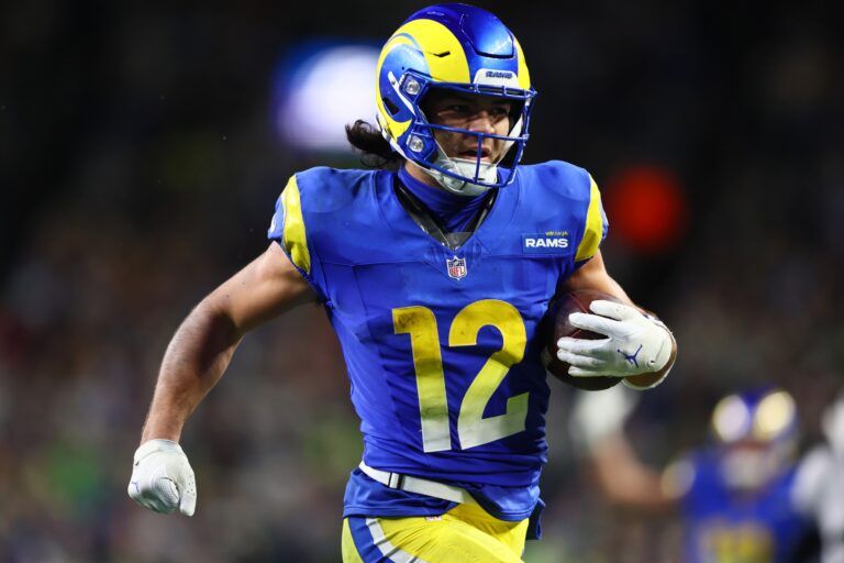 Los Angeles Rams wide receiver Puka Nacua (12) runs for a touchdown against the Seattle Seahawks in overtime at Lumen Field.