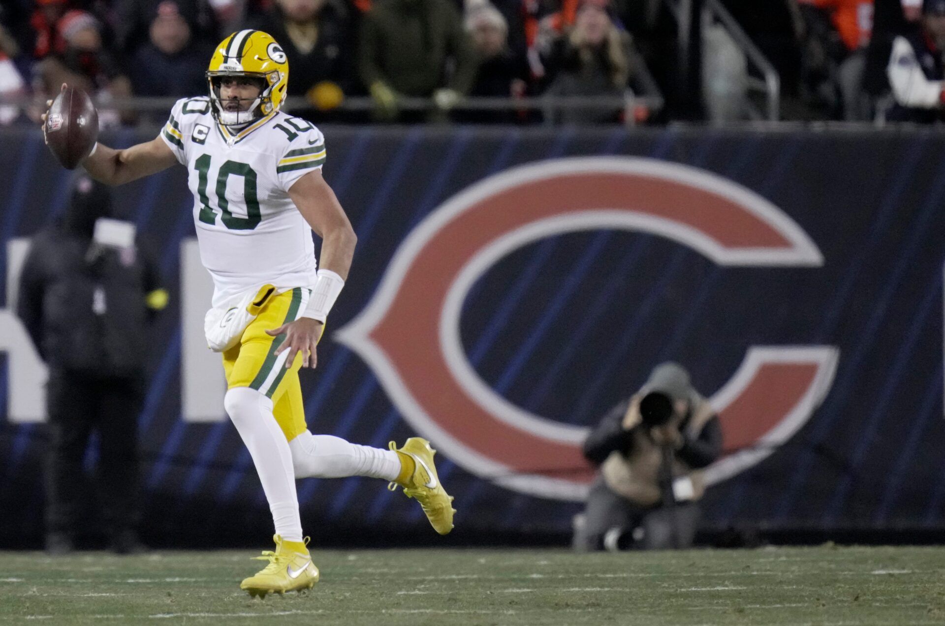 Green Bay Packers quarterback Jordan Love (10) rolls out during the first quarter of their game against the Chicago Bears Saturday, December 20, 2025 at Soldier Field in Chicago, Illinois.