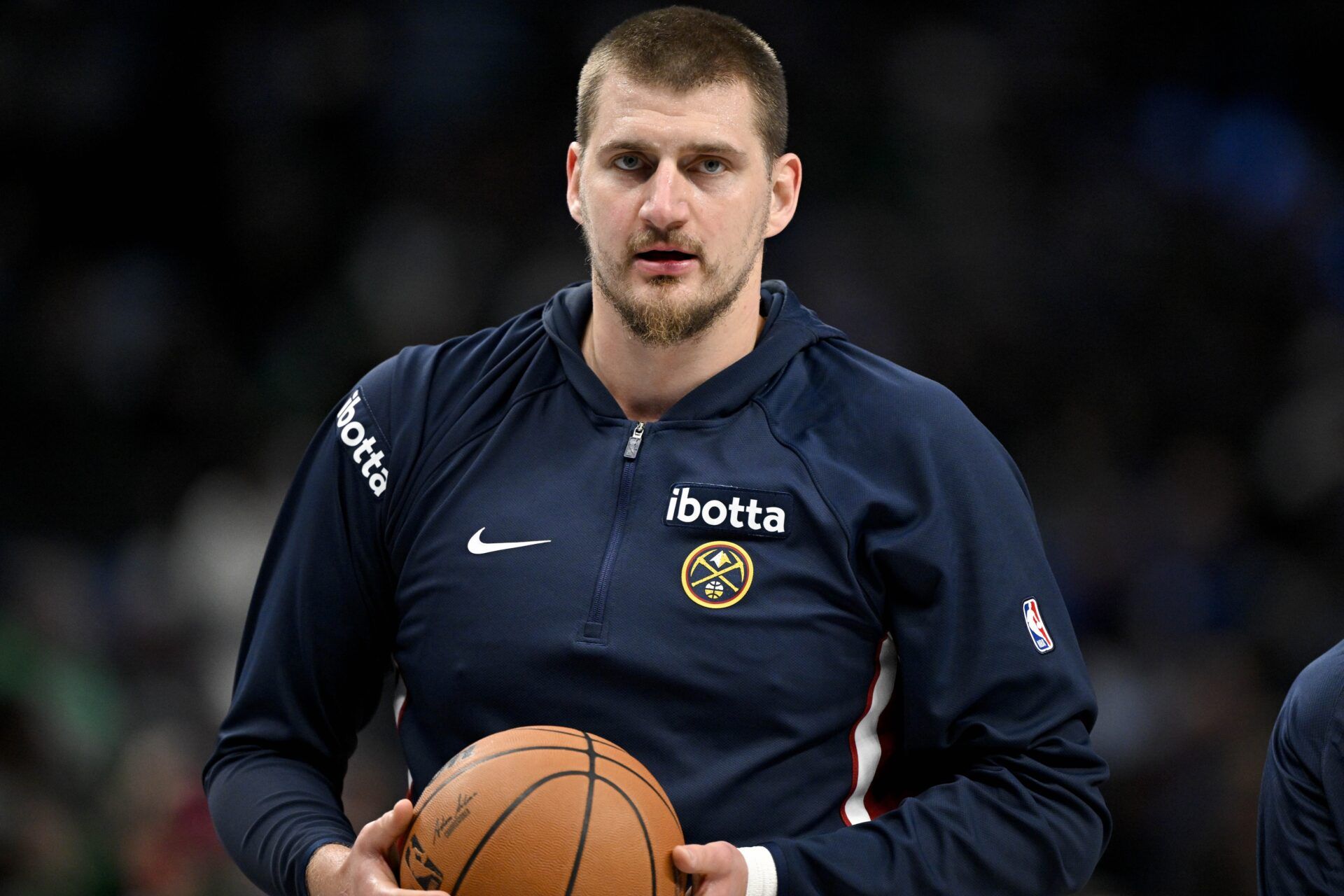 Denver Nuggets center Nikola Jokic (15) looks on before the game between the Mavericks and the Nuggets at the American Airlines Center.