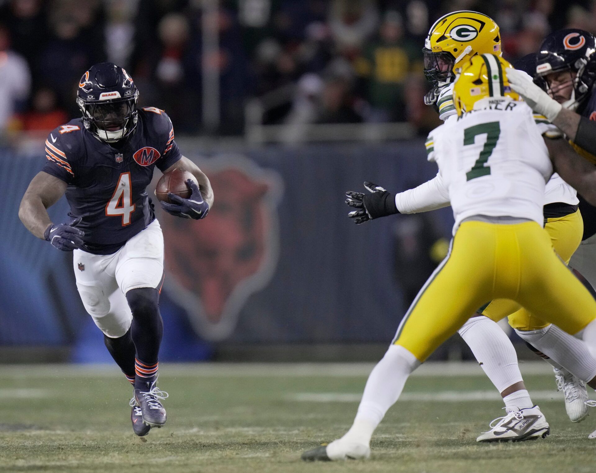 Chicago Bears running back D'Andre Swift (4) finds a hole during the fourth quarter of their game Saturday, December 20, 2025 at Soldier Field in Chicago, Illinois. The Chicago Bears beat the Green Bay Packers 22-16 in overtime.