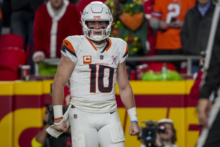 Denver Broncos quarterback Bo Nix (10) celebrates after a touchdown at GEHA Field at Arrowhead Stadium.