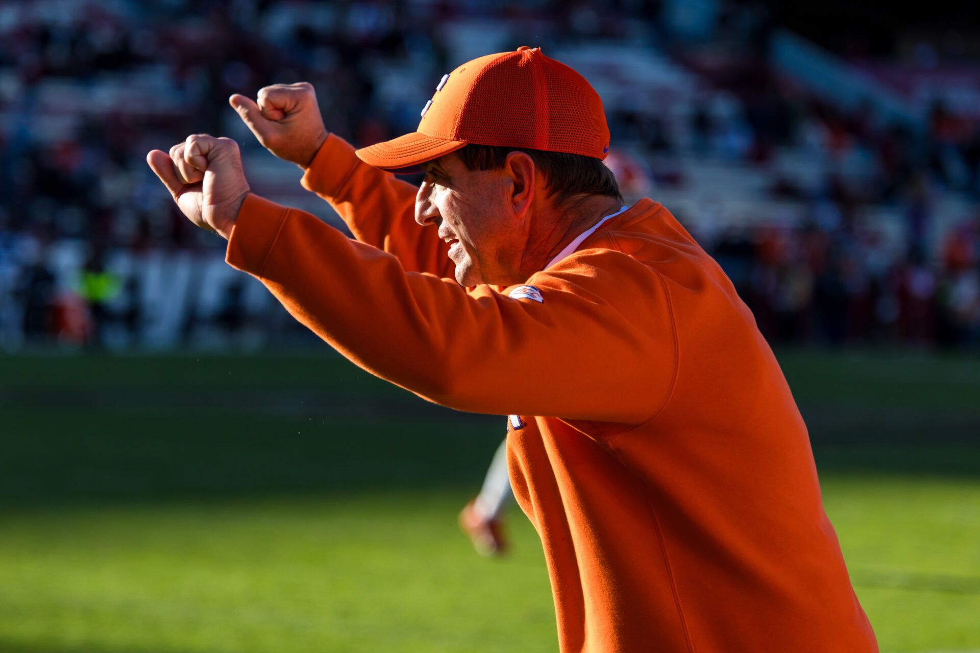Clemson Tigers head coach Dabo Swinney celebrates a play against the South Carolina Gamecocks in the fourth quarter at Williams-Brice Stadium.
