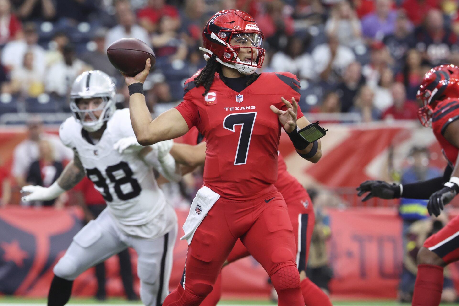 Houston Texans quarterback C.J. Stroud (7) attempts a pass during the first half against the Las Vegas Raiders at NRG Stadium.