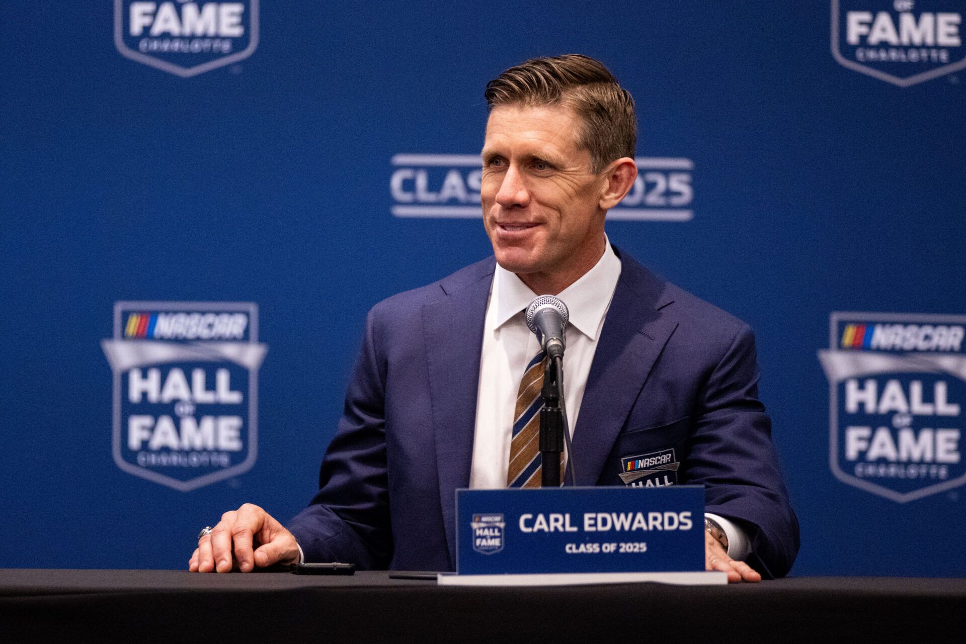 Former driver Carl Edwards speaks with the media after being inducted into the NASCAR Hall Of Fame at Charlotte Convention Center Crown Ballroom.