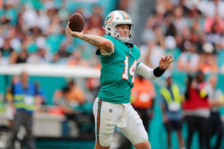 Miami Dolphins quarterback Quinn Ewers (14) runs the ball during the third quarter against the Cincinnati Bengals at Hard Rock Stadium.