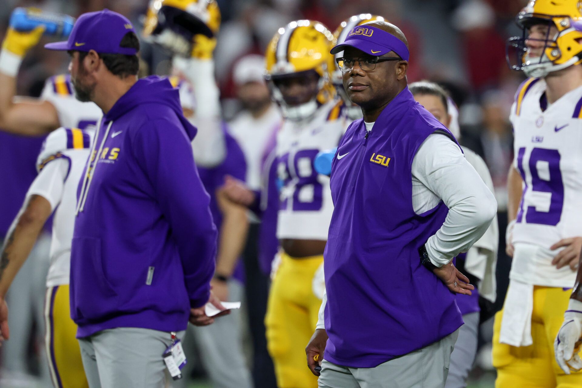 Louisiana State Tigers interim head coach Frank Wilson looks on during warmups prior to the game against the Alabama Crimson Tide at Saban Field at Bryant-Denny Stadium.