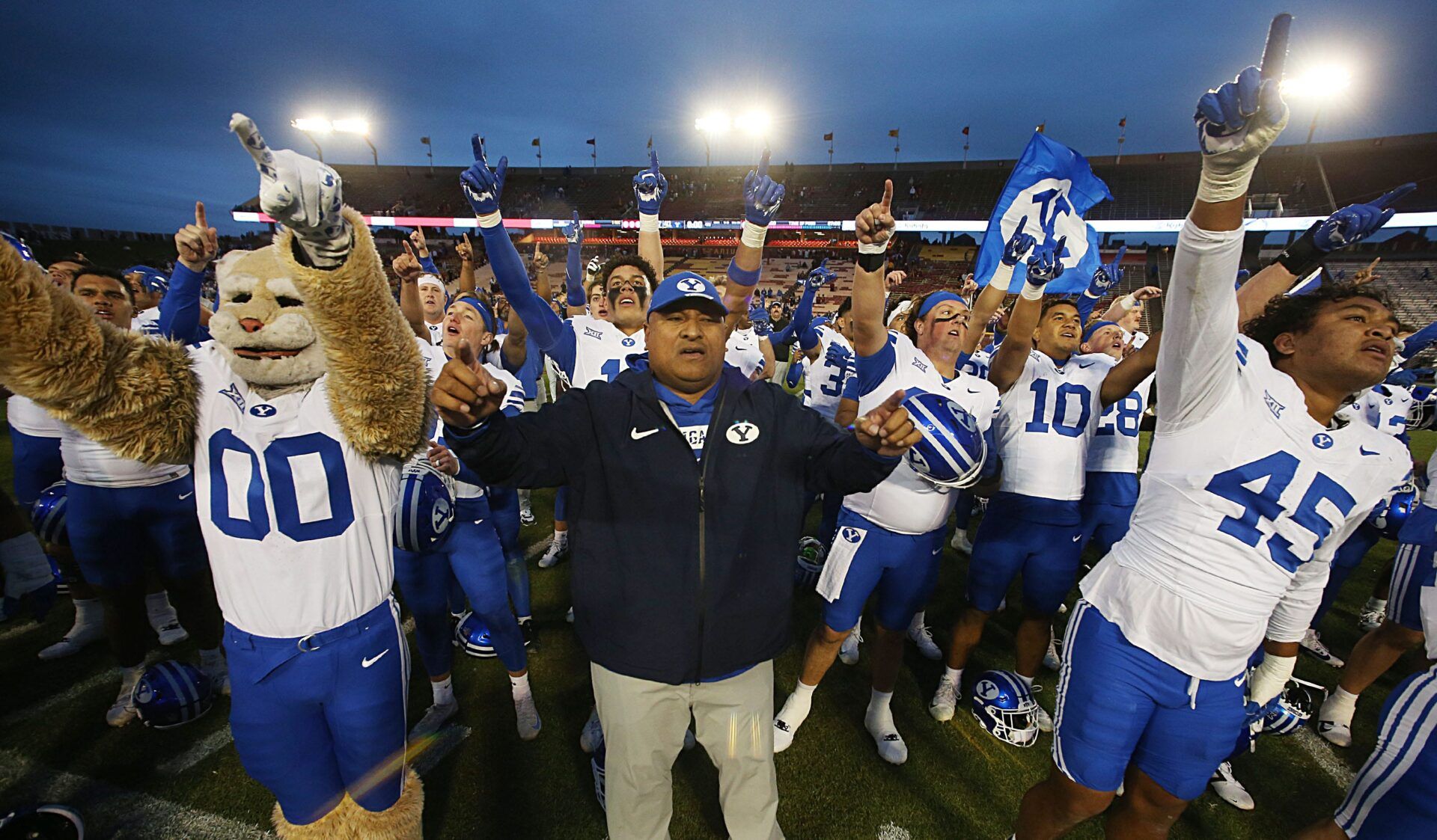 BYU Cougars football head coach Kalani Sitake celebrates with the team after winning 41-27 over Iowa State at Jack Trice Stadium on Oct. 25, 2025, in Ames, Iowa.