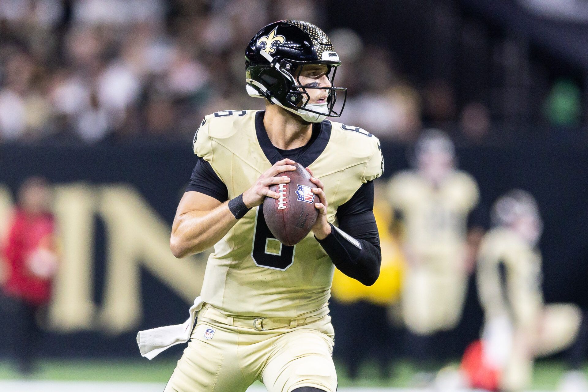 New Orleans Saints quarterback Tyler Shough (6)  drops back to pass against the New York Jets during the first half  at Caesars Superdome.
