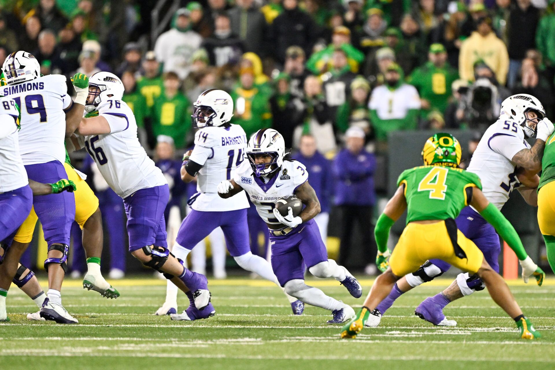James Madison Dukes running back Wayne Knight (3) rushes during the third quarter against the Oregon Ducks at Autzen Stadium.