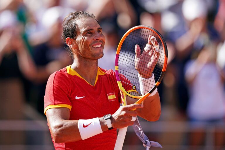 Rafael Nadal (ESP) celebrates after his match against Marton Fucsovics (HUN) in the men’s tennis singles first round during the Paris 2024 Olympic Summer Games at Stade Roland Garros.