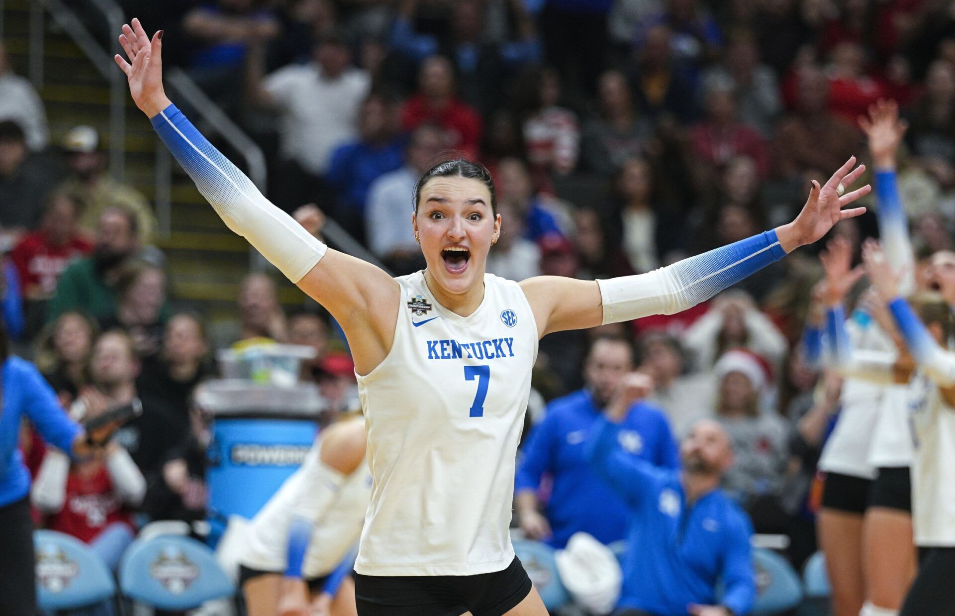 Kentucky Wildcats outside hitter Eva Hudson (7) celebrates after a point during the fourth set against the Wisconsin Badgers in a 2025 NCAA Women’s Volleyball Championship semifinal match at T-Mobile Center.