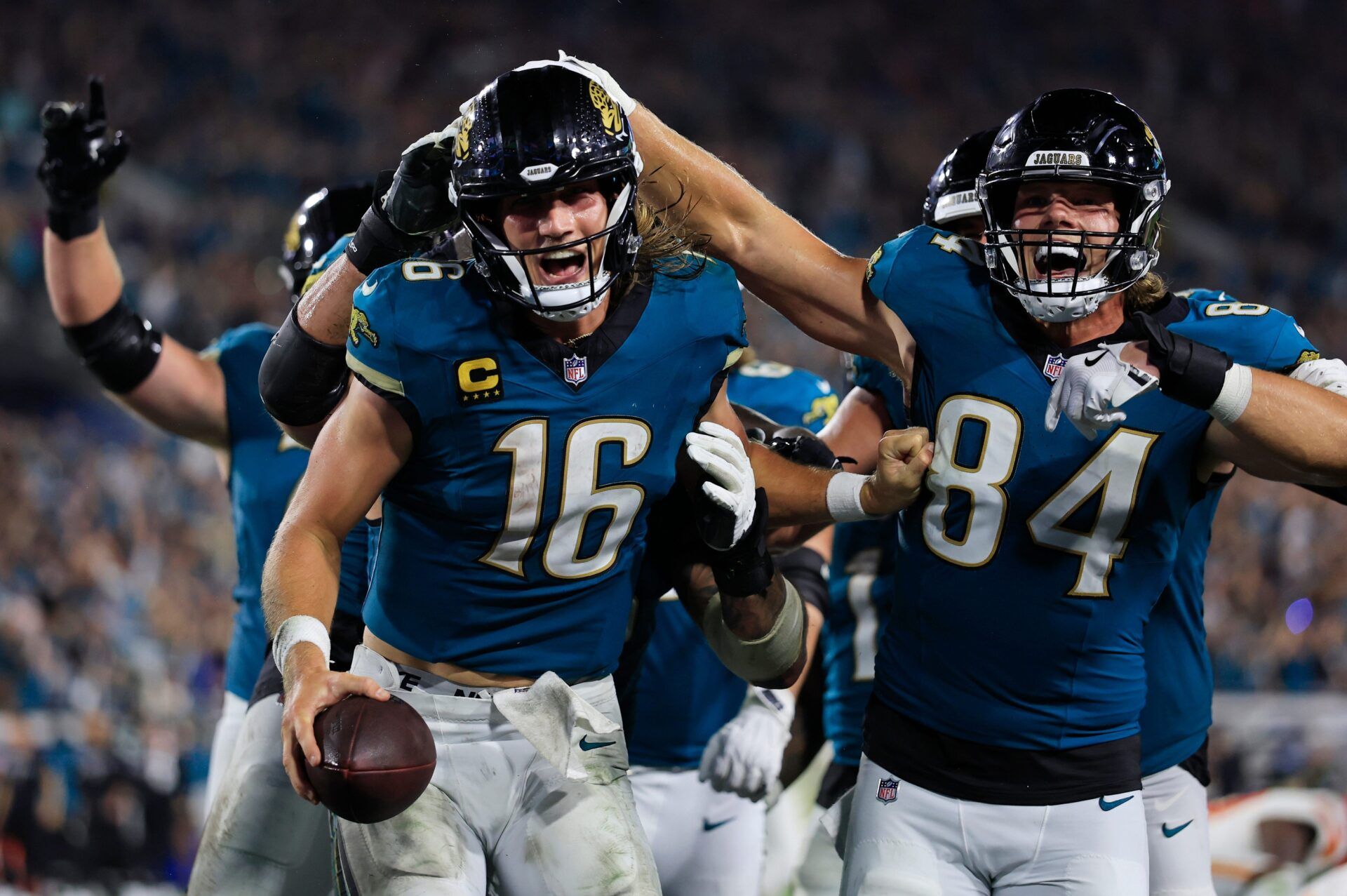Jacksonville Jaguars quarterback Trevor Lawrence (16) celebrates his game-winning touchdown as tight end Hunter Long (84) reacts during the fourth quarter of an NFL football matchup at EverBank Stadium, Monday, Oct. 6, 2025, in Jacksonville, Fla. The Jacksonville Jaguars edged the Kansas City Chiefs 31-28. [Corey Perrine/Florida Times-Union]