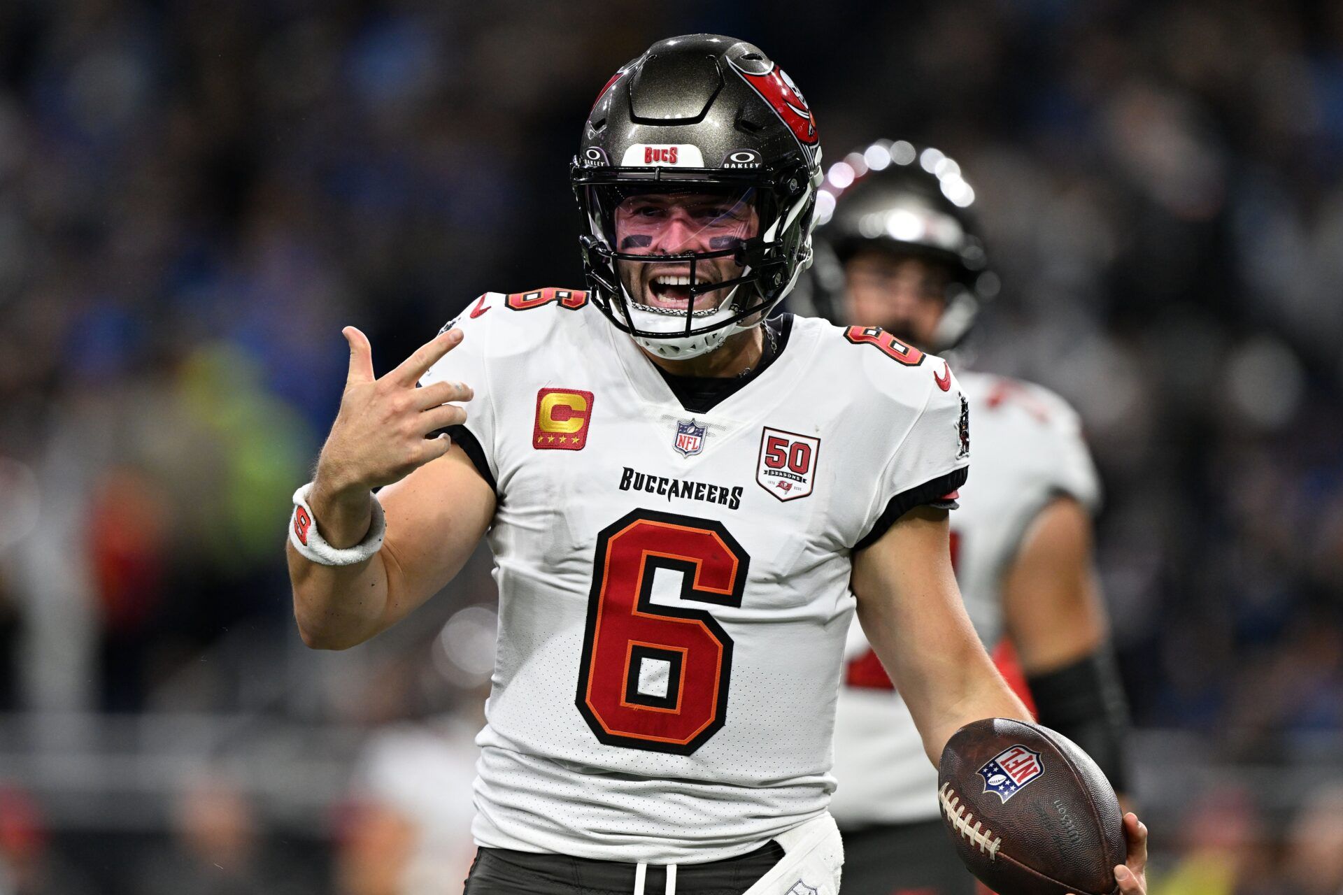 Tampa Bay Buccaneers quarterback Baker Mayfield (6) reacts against the Detroit Lions during the first half at Ford Field.