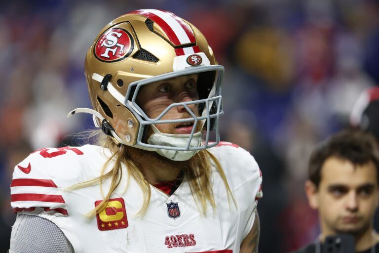 San Francisco 49ers tight end George Kittle (85) looks on during warmups before the game against the Indianapolis Colts at Lucas Oil Stadium.