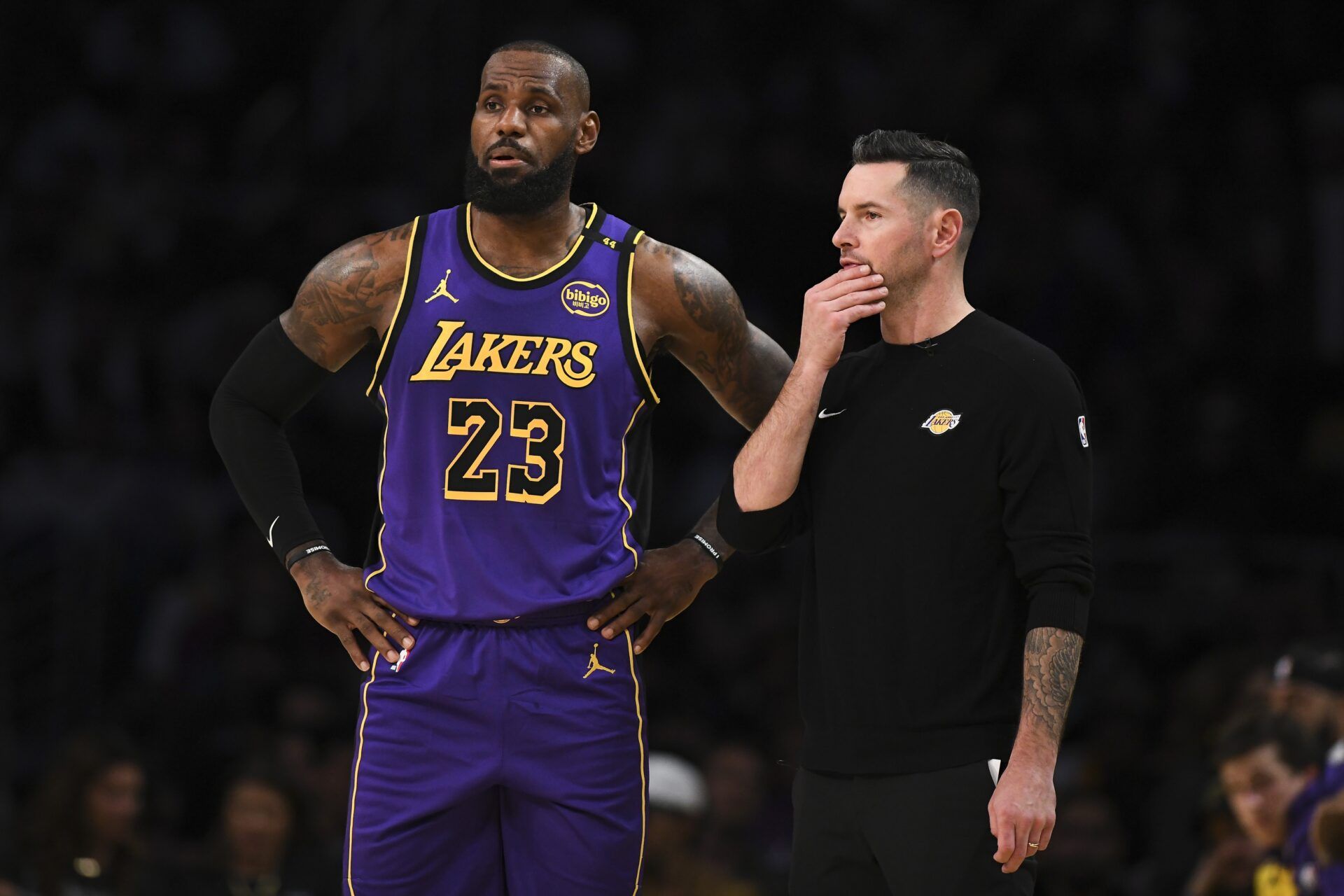 Los Angeles Lakers forward LeBron James (23) with Los Angeles Lakers head coach JJ Redick against the Phoenix Suns during the first half at Crypto.com Arena.