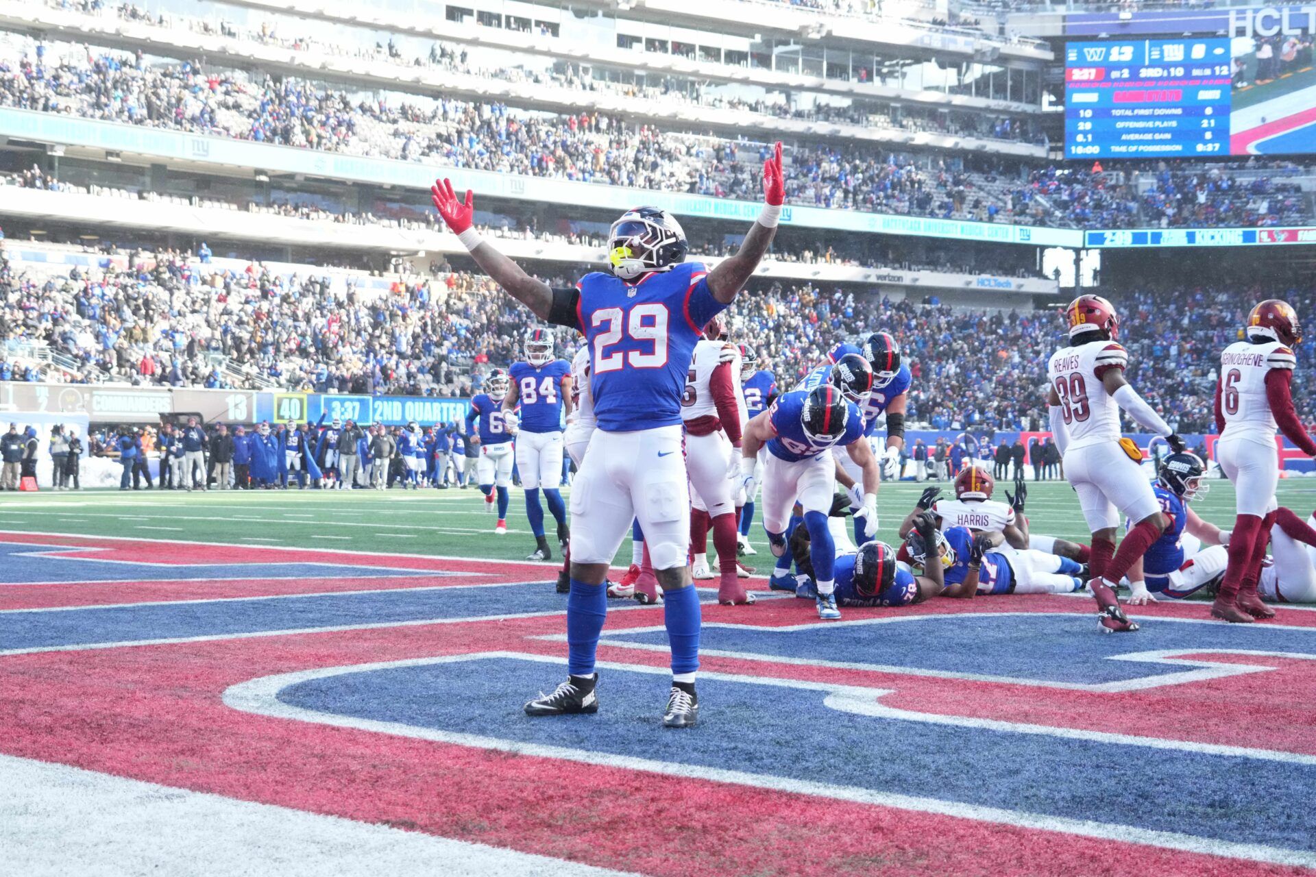 New York Giants running back Tyrone Tracy Jr. (29) celebrates scoring a touchdown during the second quarter against the Washington Commanders at MetLife Stadium.