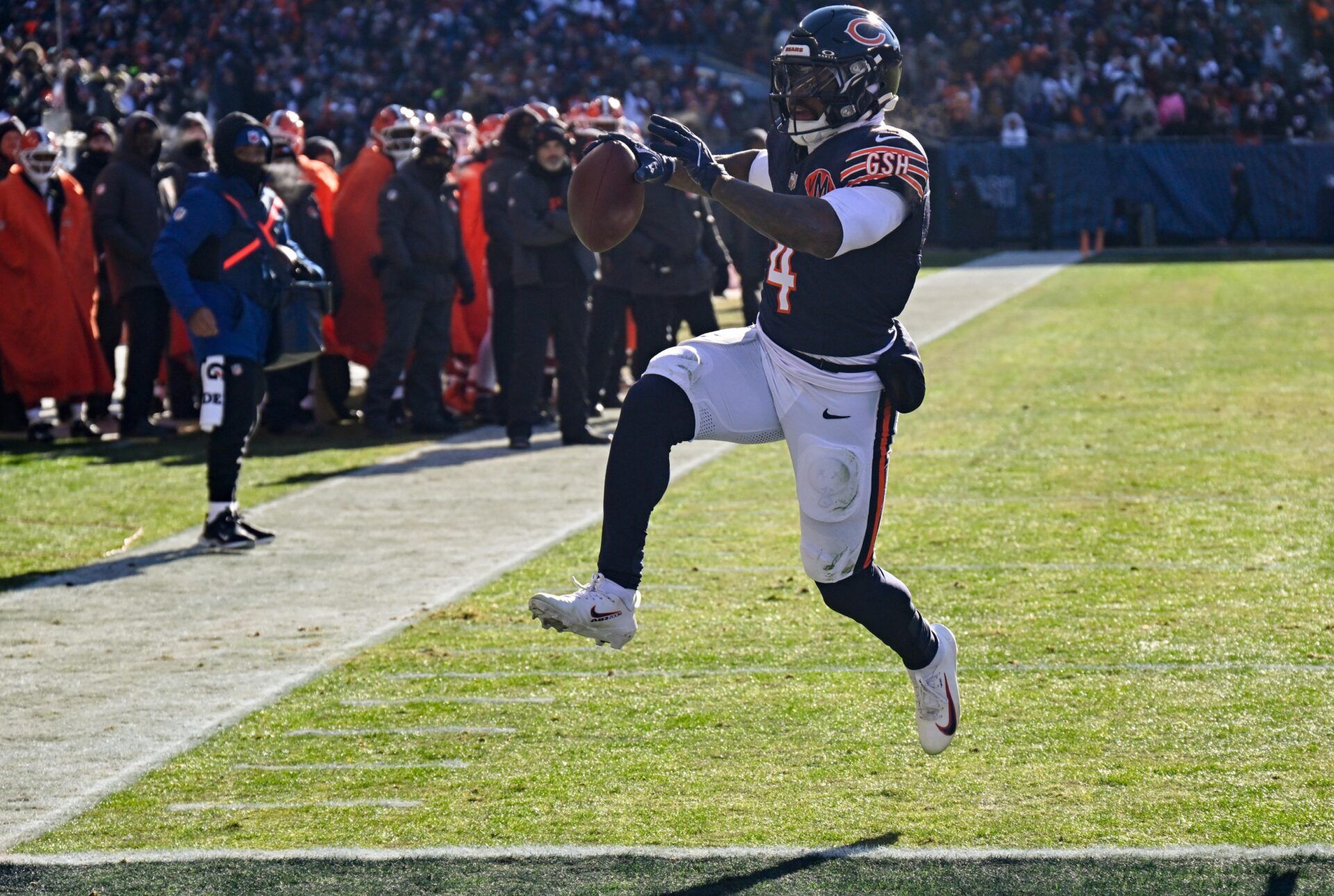 Chicago Bears running back D'Andre Swift (4) scores a touchdown during the first quarter against the Cleveland Browns at Soldier Field.