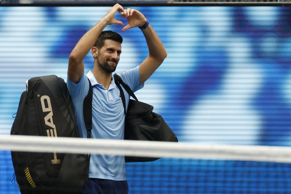 Novak Djokovic (SRB) waves to the crowd while leaving the court after his match against Carlos Alcaraz (ESP) (not pictured) in a men's singles semifinal on day thirteen of the 2025 US Open tennis championships at USTA Billie Jean King National Tennis Center.