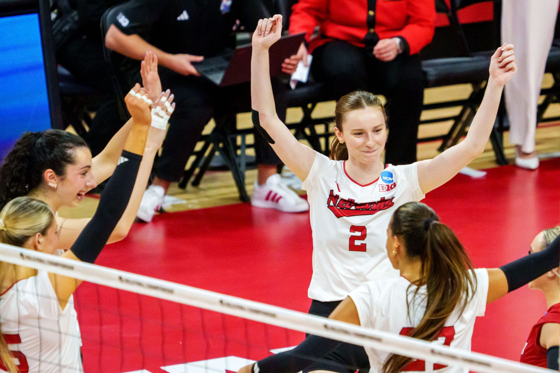 Nebraska Cornhuskers setter Bergen Reilly (2) celebrates after winning the second set against the Kansas Jayhawks at Bob Devaney Sports Center.