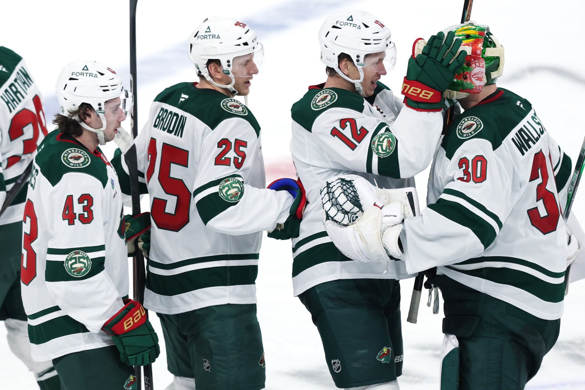 mw players celebrate their overtime win against the Winnipeg Jets at Canada Life Centre.