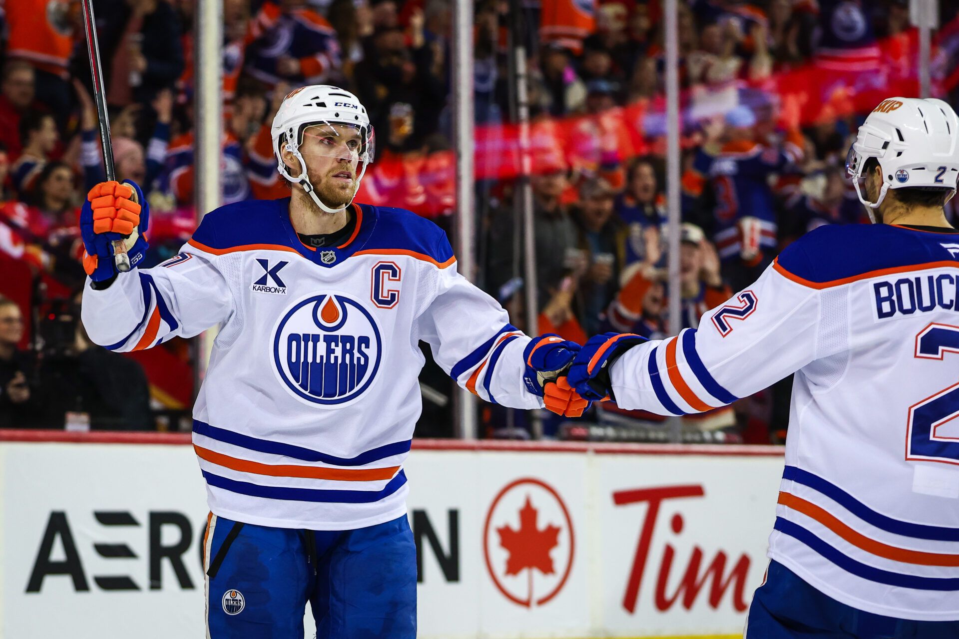 Edmonton Oilers center Connor McDavid (97) celebrates his goal with teammates against the Calgary Flames during the third period at Scotiabank Saddledome.
