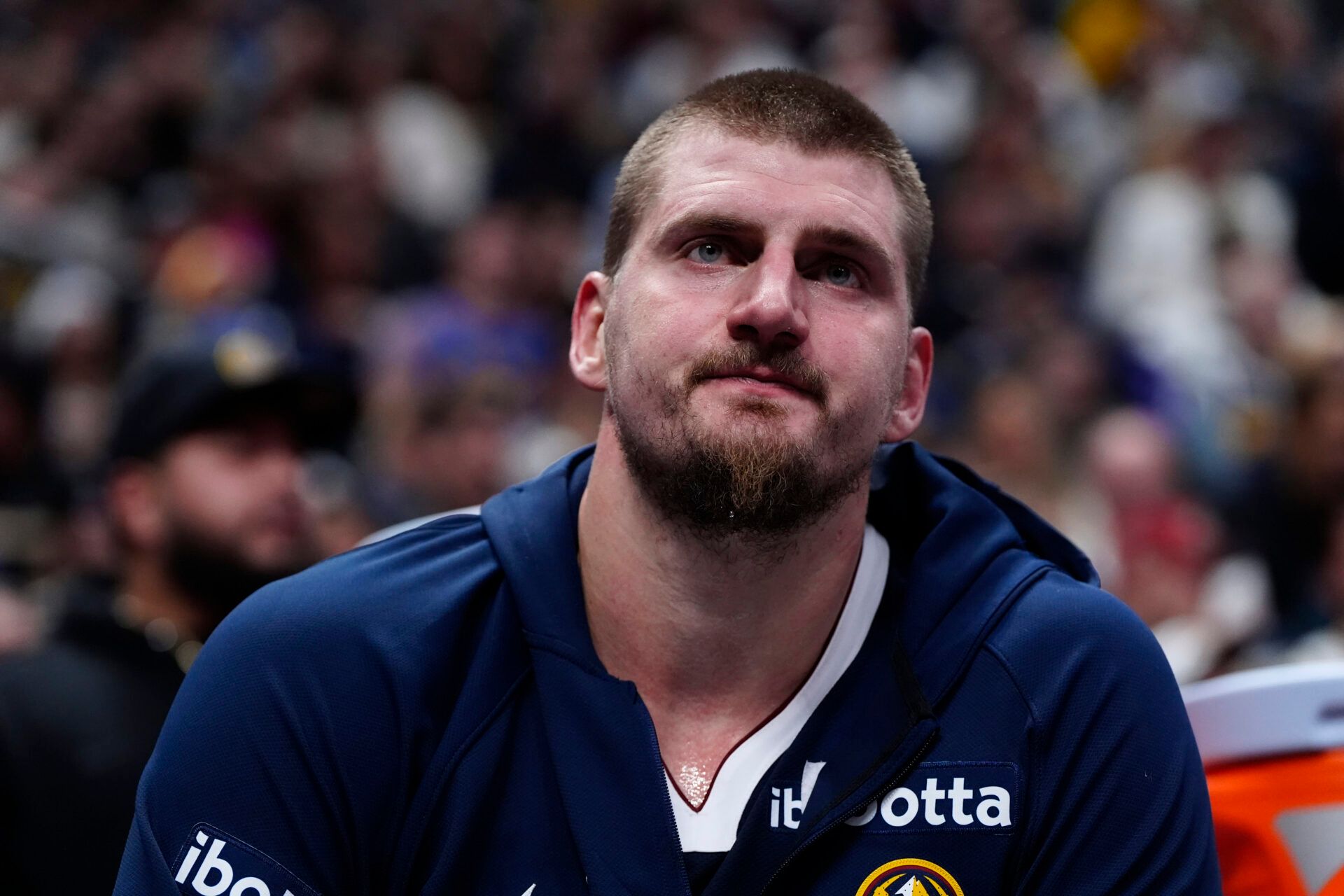 Denver Nuggets center Nikola Jokic (15) on the bench in the second quarter against the Orlando Magic at Ball Arena.