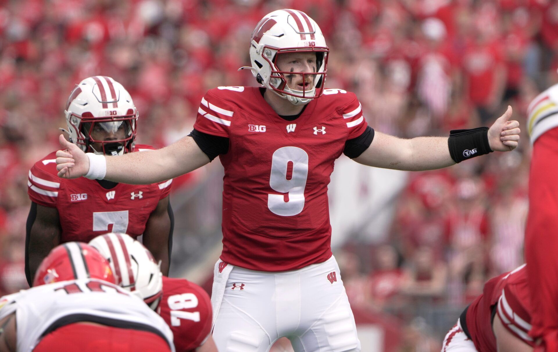 Wisconsin quarterback Billy Edwards Jr. (9) makes a call at the line during the first quarter of their game against Maryland Saturday, September 20, 2025 at Camp Randall Stadium in Madison, Wisconsin.
