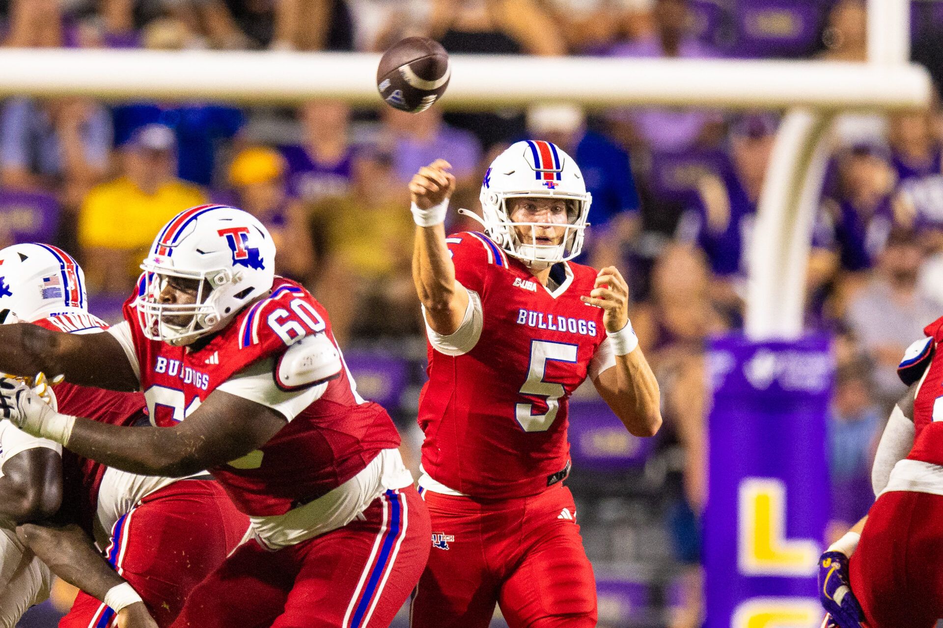 Louisiana Tech Bulldogs quarterback Blake Baker (5) passes against LSU Tigers during the second half  at Tiger Stadium.