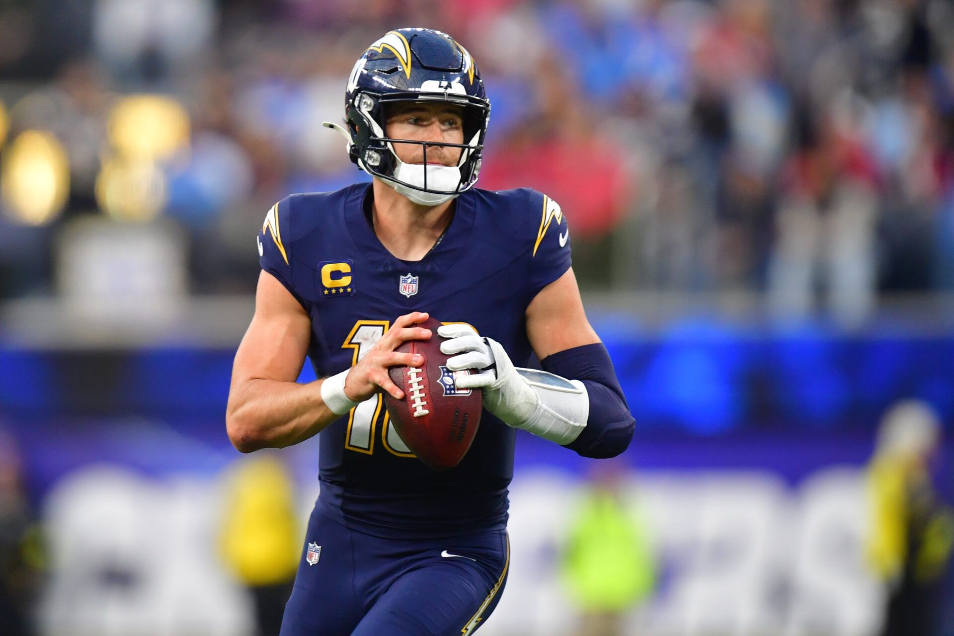 Los Angeles Chargers quarterback Justin Herbert (10) looks downfield against the Houston Texans during the second half at SoFi Stadium.