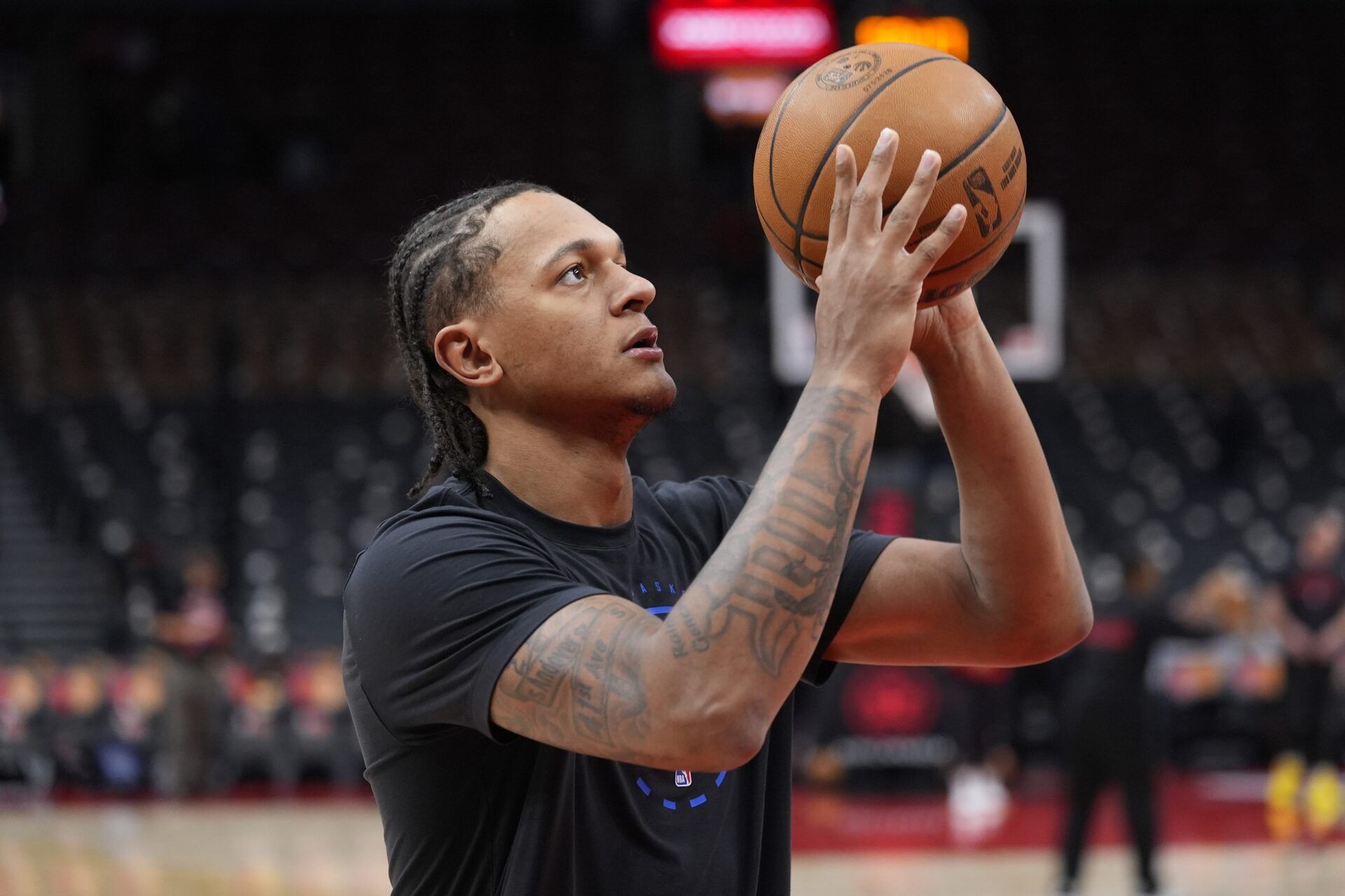 Orlando Magic forward Paolo Banchero (5) goes to shoot a basket during warm-up before a game against the Toronto Raptors at Scotiabank Arena.