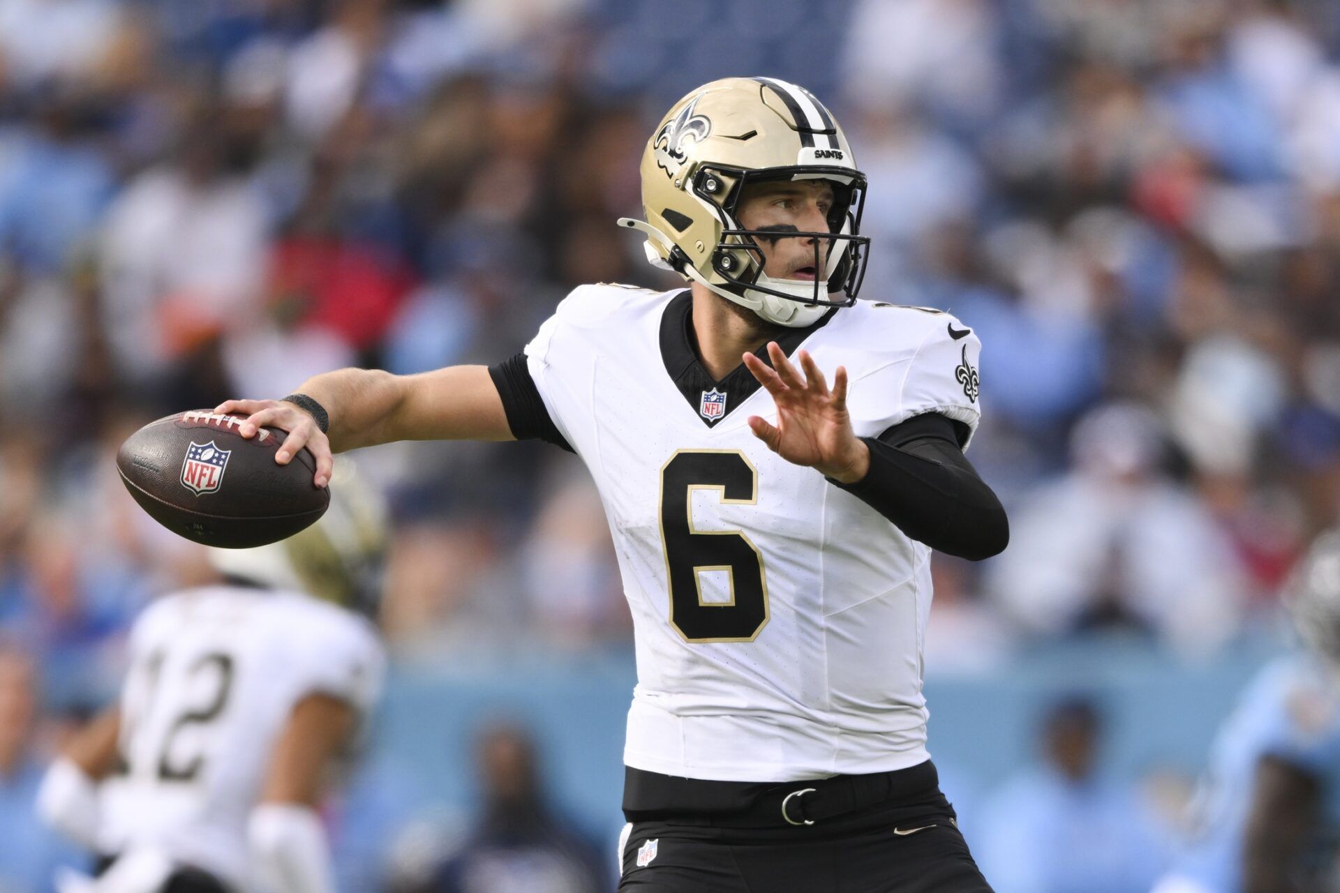 New Orleans Saints quarterback Tyler Shough (6) passes against the Tennessee Titans during the first half of the game at Nissan Stadium.