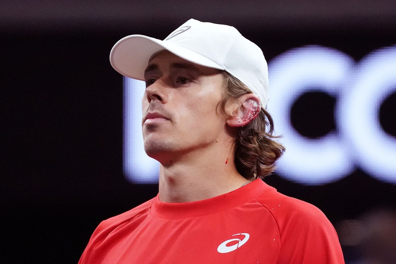 Team World Player Alex de Minaur injures his ear after hitting it with his racket during a doubles match against Team Europe players Holger Rune and Casper Ruud at the Laver Cup at Chase Center.