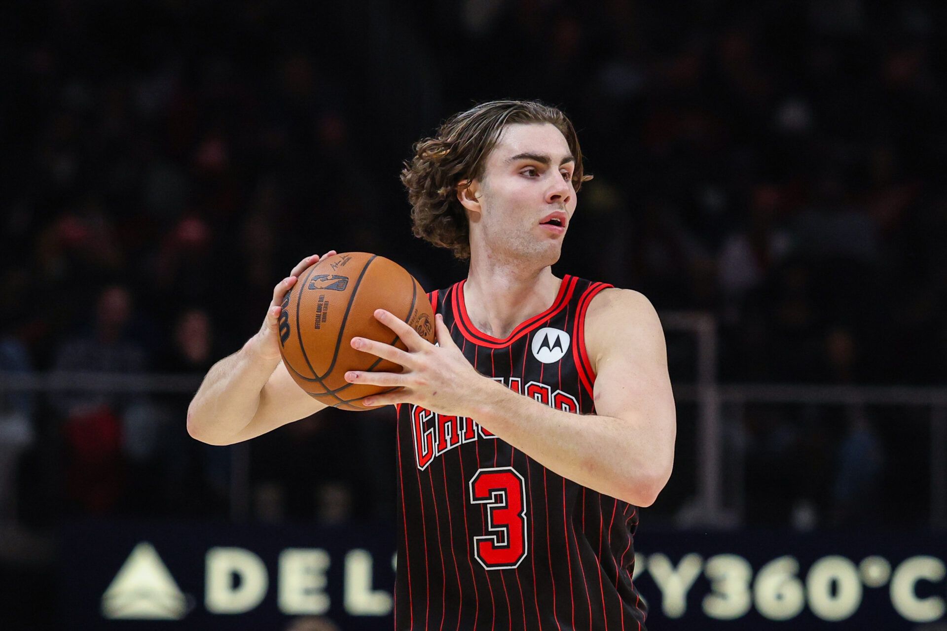 Chicago Bulls guard Josh Giddey (3) looks for a pass against the Atlanta Hawks during the third quarter at State Farm Arena.