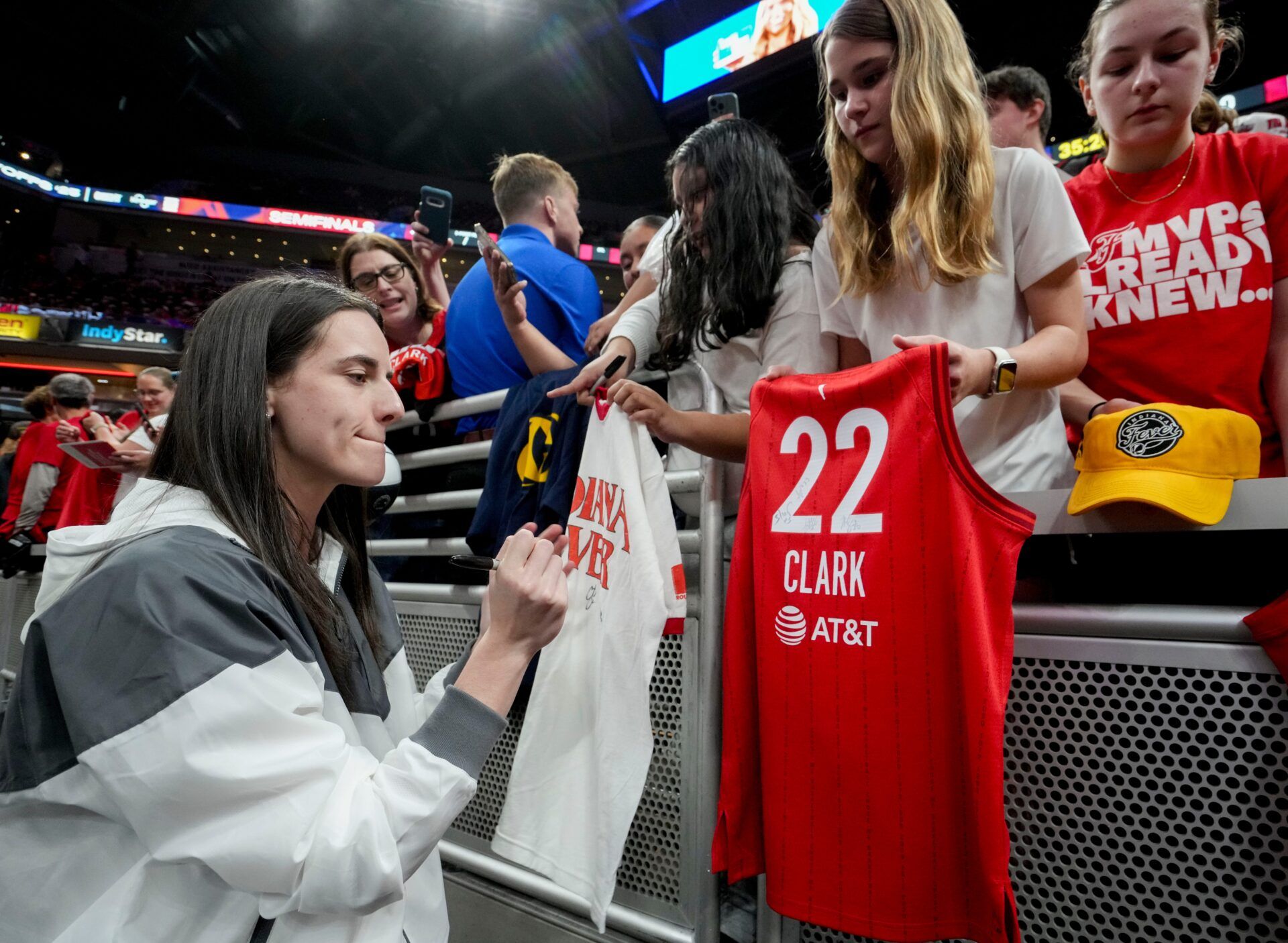 Indiana Fever guard Caitlin Clark (22) signs autographs Friday, Sept. 26, 2025, ahead of Game 3 of the WNBA semifinals against the Las Vegas Aces at Gainbridge Fieldhouse in Indianapolis.