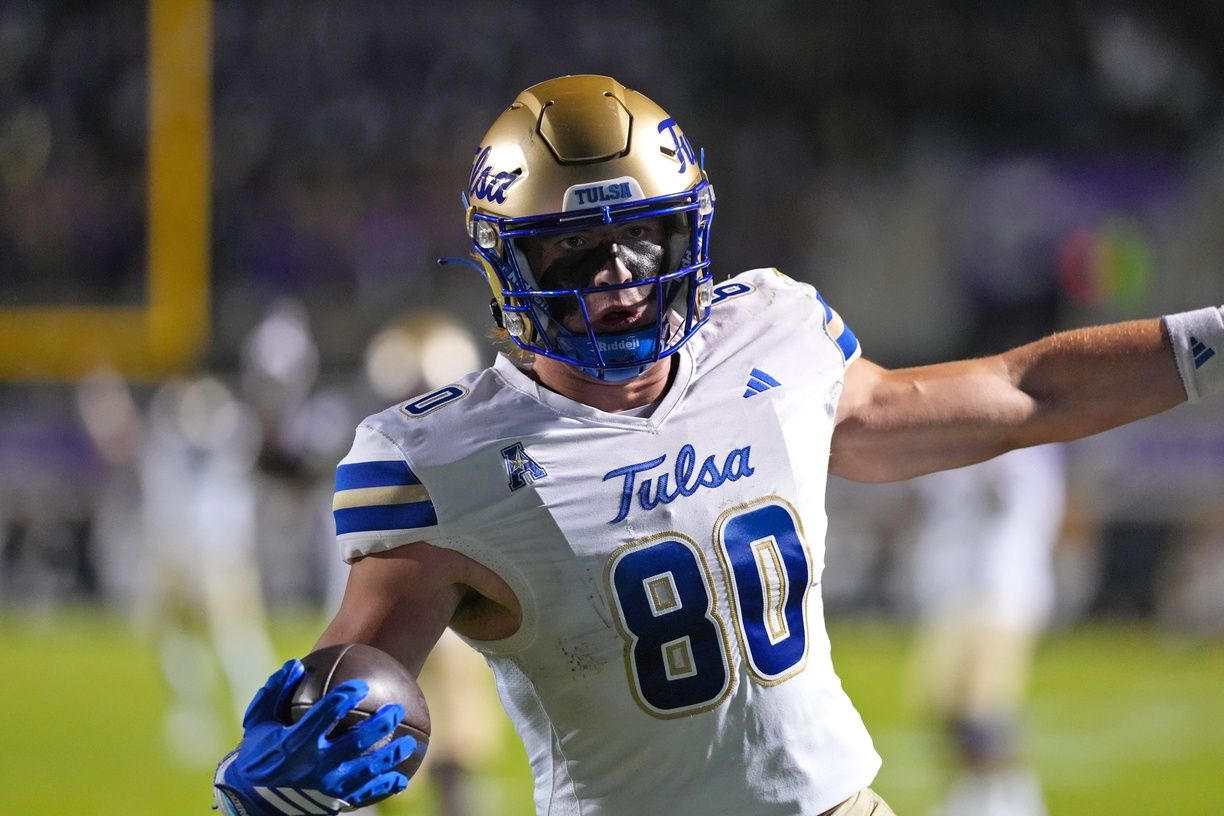 Tulsa Golden Hurricane tight end Brody Foley (80) scores a touchdown on his catch against the East Carolina Pirates during the first half at Dowdy-Ficklen Stadium.