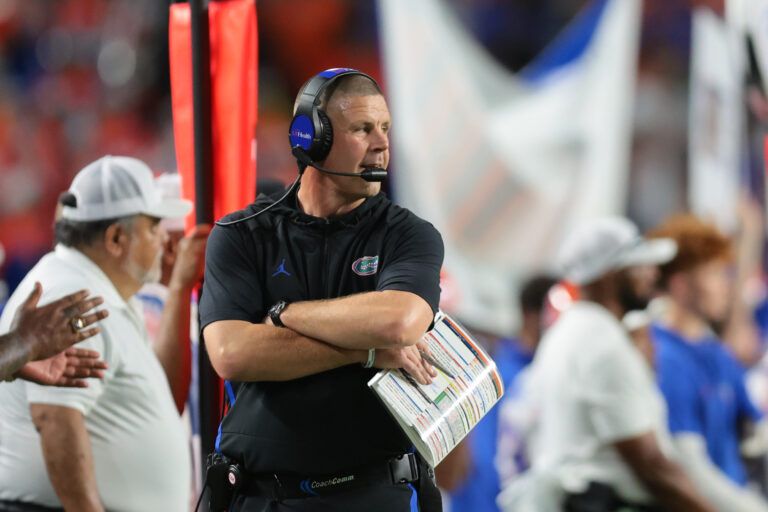 Florida Gators head coach Billy Napier watches from the sideline against the Miami Hurricanes during the third quarter at Hard Rock Stadium.