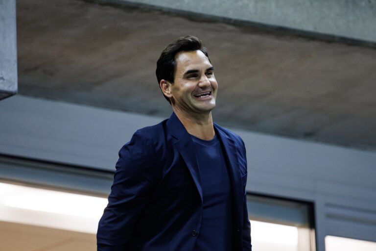 Roger Federer watches Aryna Sabalenka of Russia playing Qinwen Zheng of China on day nine of the U.S. Open tennis tournament at the USTA Billie Jean King National Tennis Center.