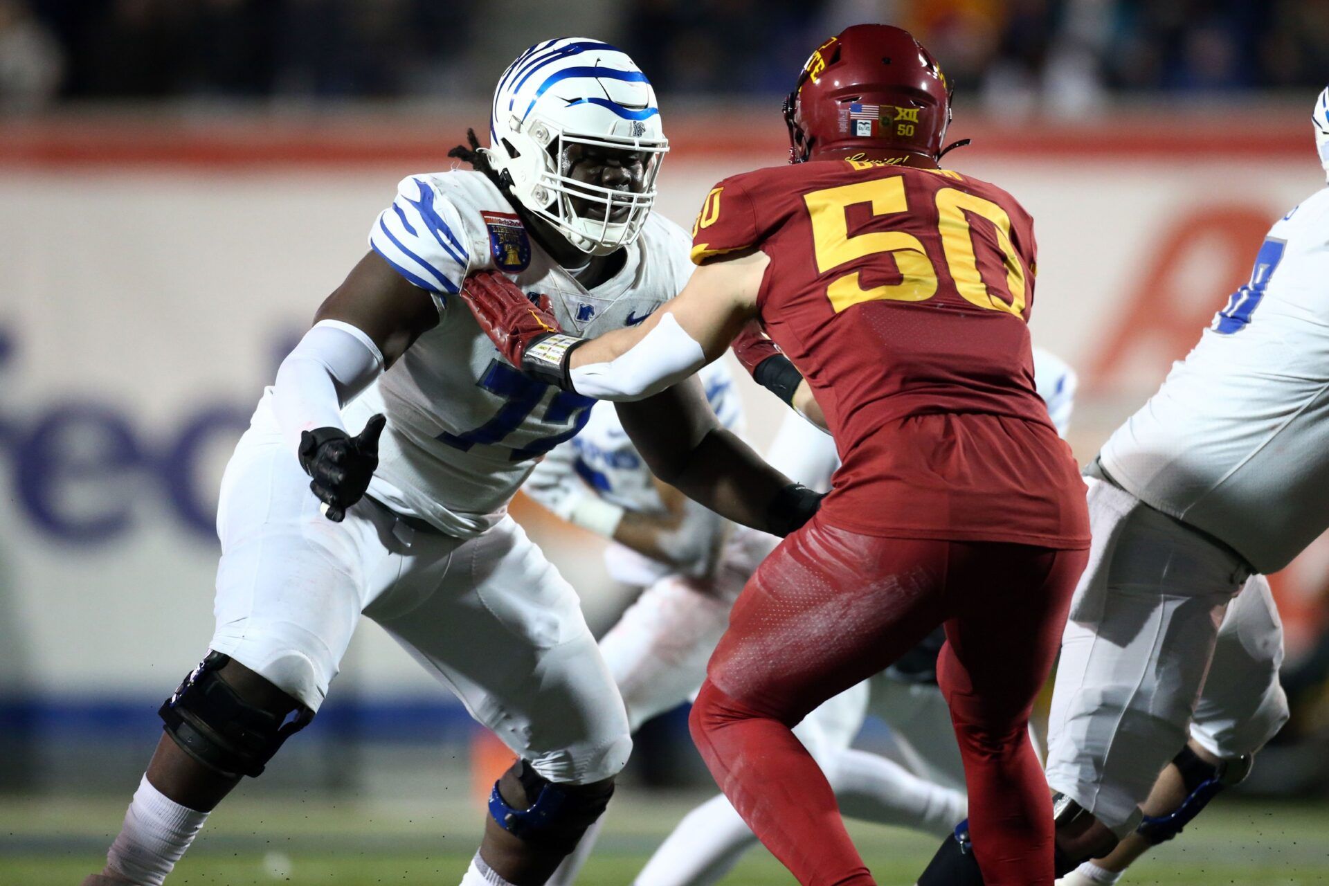 Memphis Tigers offensive linemen Malachi Breland (72) blocks Iowa State Cyclones linebacker Caleb Bacon (50) during the second half at Simmons Bank Liberty Stadium.