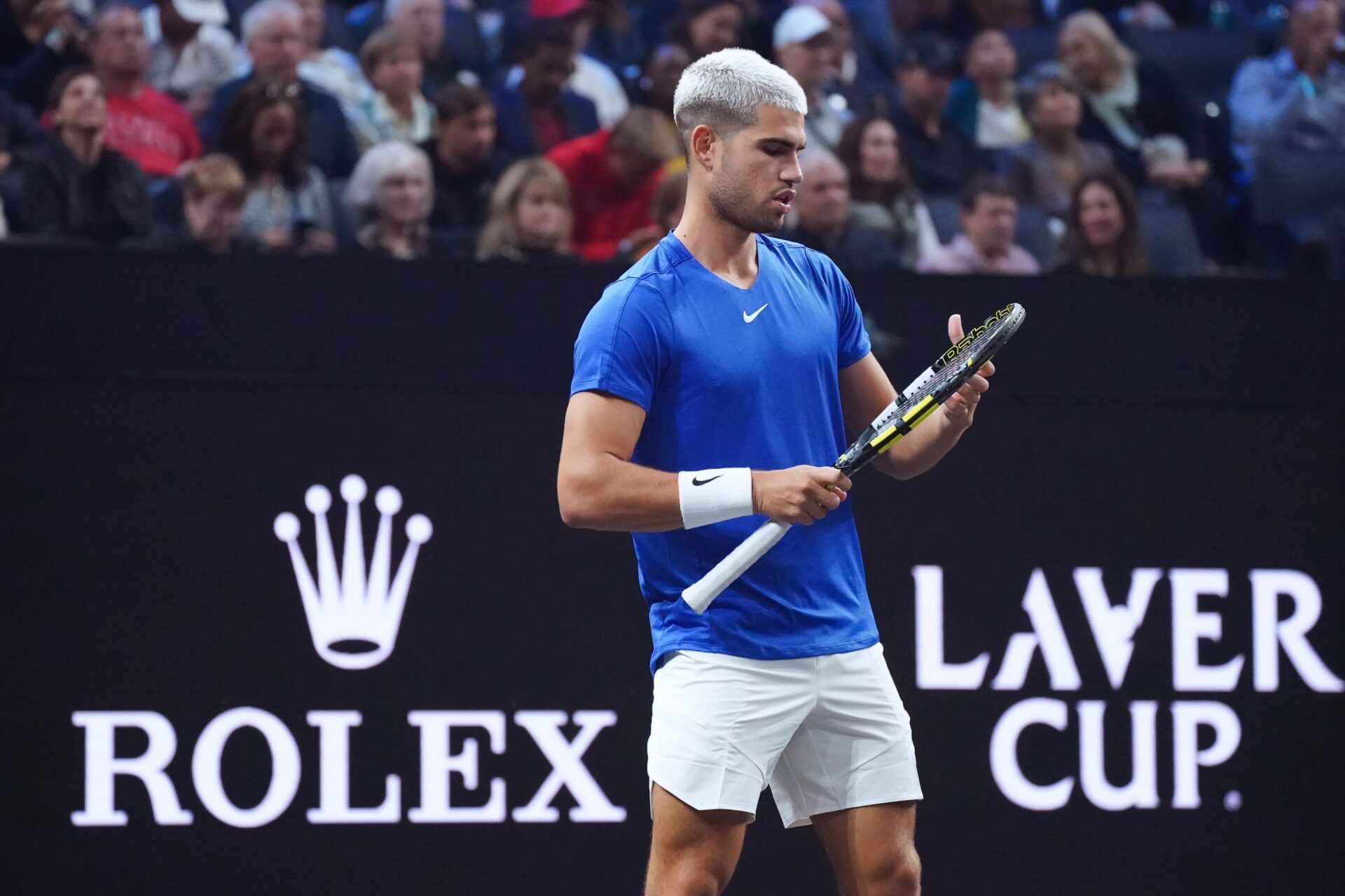 Team Europe player Carlos Alcaraz adjusts his strings during his doubles match against Team World during the Laver Cup at Chase Center.