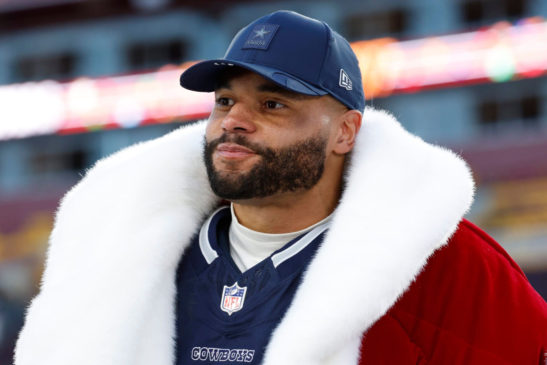 Dallas Cowboys quarterback Dak Prescott (4) is interviewed after defeating the Washington Commanders at Northwest Stadium.