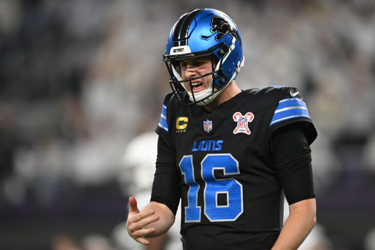 Detroit Lions quarterback Jared Goff (16) reacts to throwing an interception against the Minnesota Vikings in the third quarter at U.S. Bank Stadium.