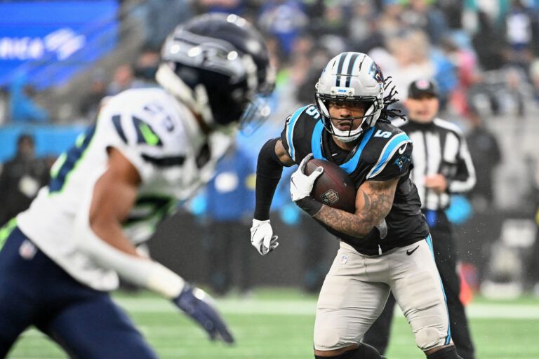 Carolina Panthers running back Rico Dowdle (5) runs the ball against the Seattle Seahawks during the second quarter at Bank of America Stadium.