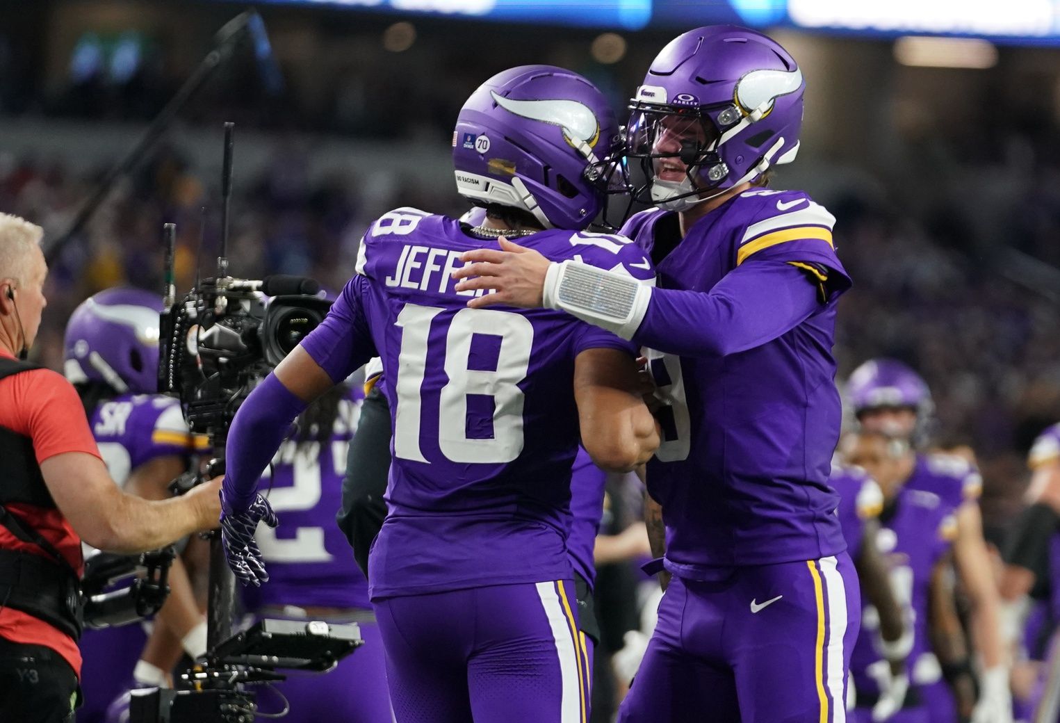 Minnesota Vikings wide receiver Justin Jefferson (18) celebrates with quarterback J.J. McCarthy (9) after a Vikings touchdown during the second half against the Dallas Cowboys at AT&T Stadium.