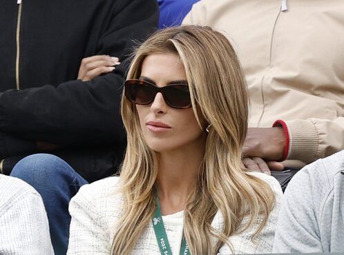 Social media influencer and girlfriend of Tommy Paul (USA)(not pictured), Paige Lorenzo (R), watches from the stands during Paul's gentlemen's singles match against Otto Virtanen (FIN)(not pictured) in a on day three of The Championships Wimbledon 2024 at All England Lawn Tennis and Croquet Club.