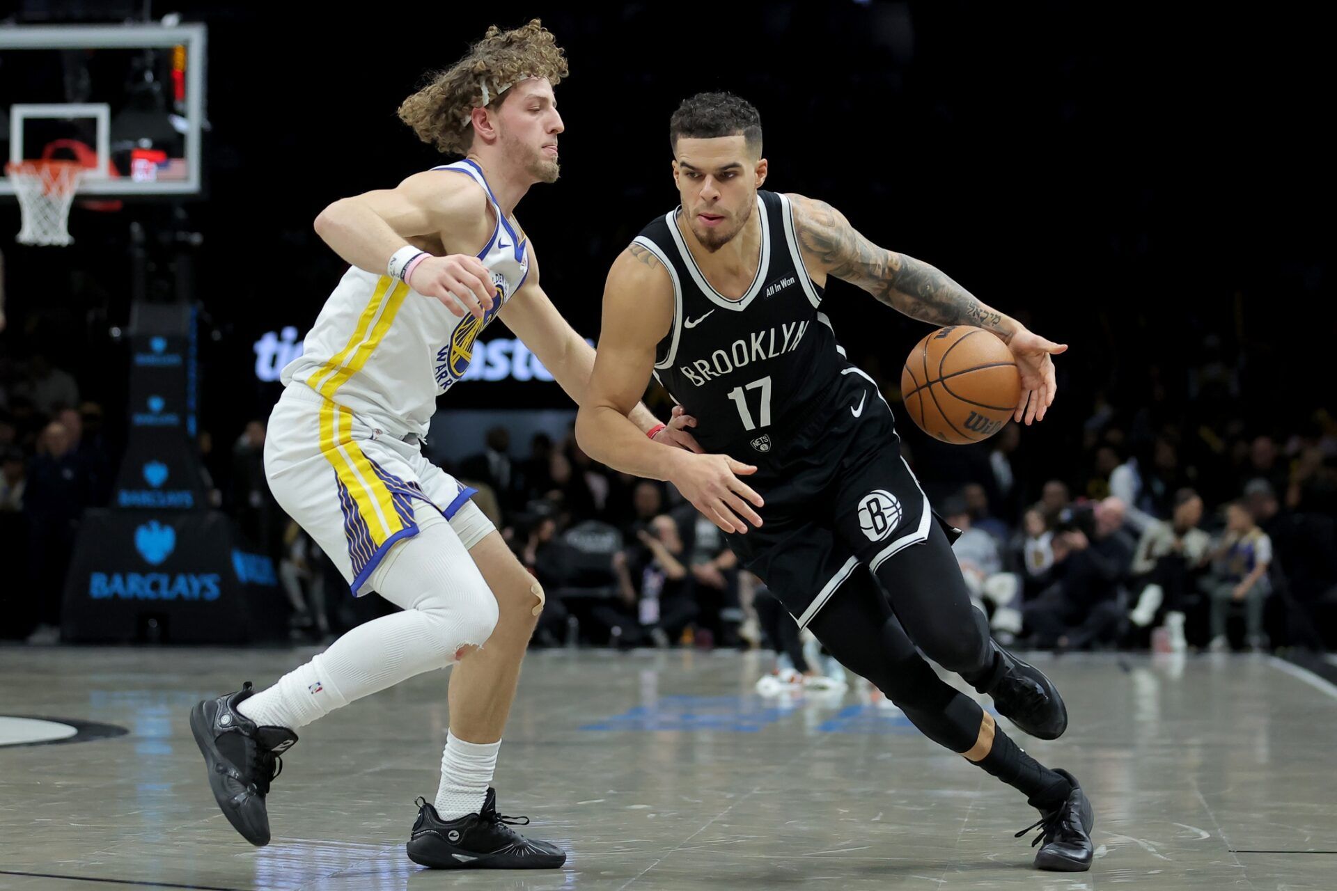 Brooklyn Nets forward Michael Porter Jr. (17) drives to the basket against Golden State Warriors guard Brandin Podziemski (2) during the third quarter at Barclays Center.