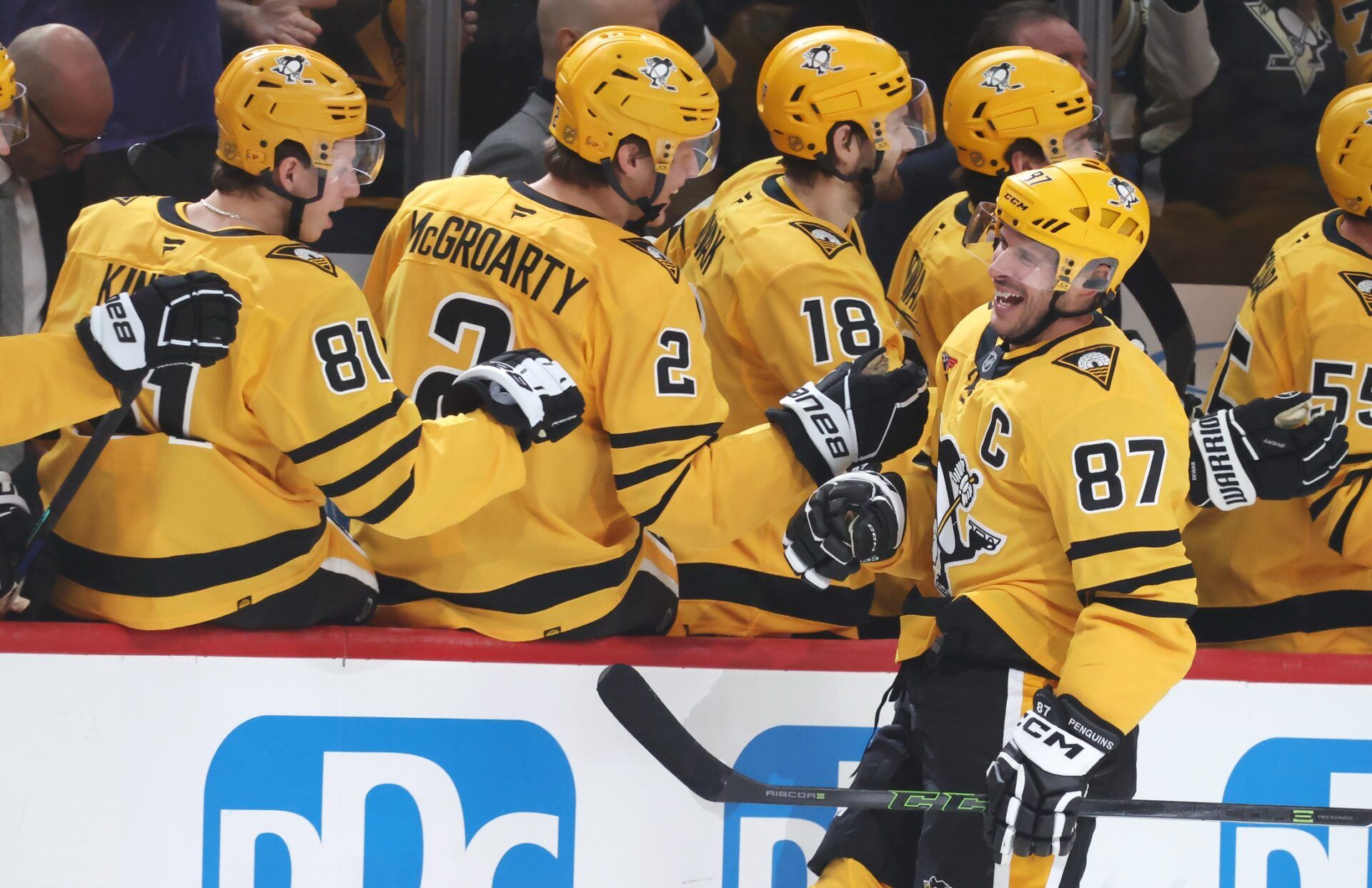 Pittsburgh Penguins center Sidney Crosby (87) celebrtaes his second goal of the game with the Penguins bench against the Detroit Red Wings during the first period at PPG Paints Arena.