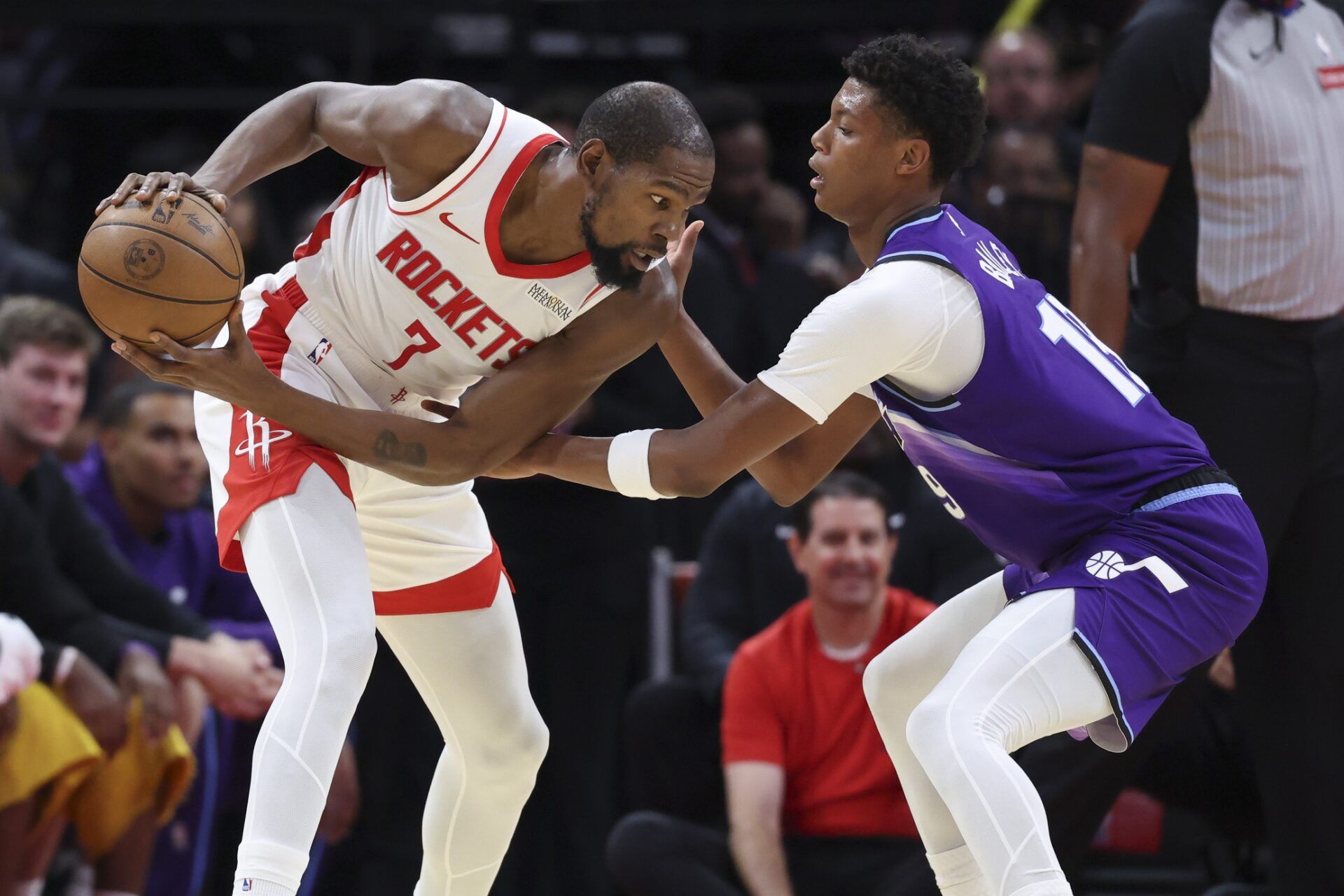 Houston Rockets forward Kevin Durant (7) controls the ball as Utah Jazz forward Ace Bailey (19) defends during the second quarter at Toyota Center.