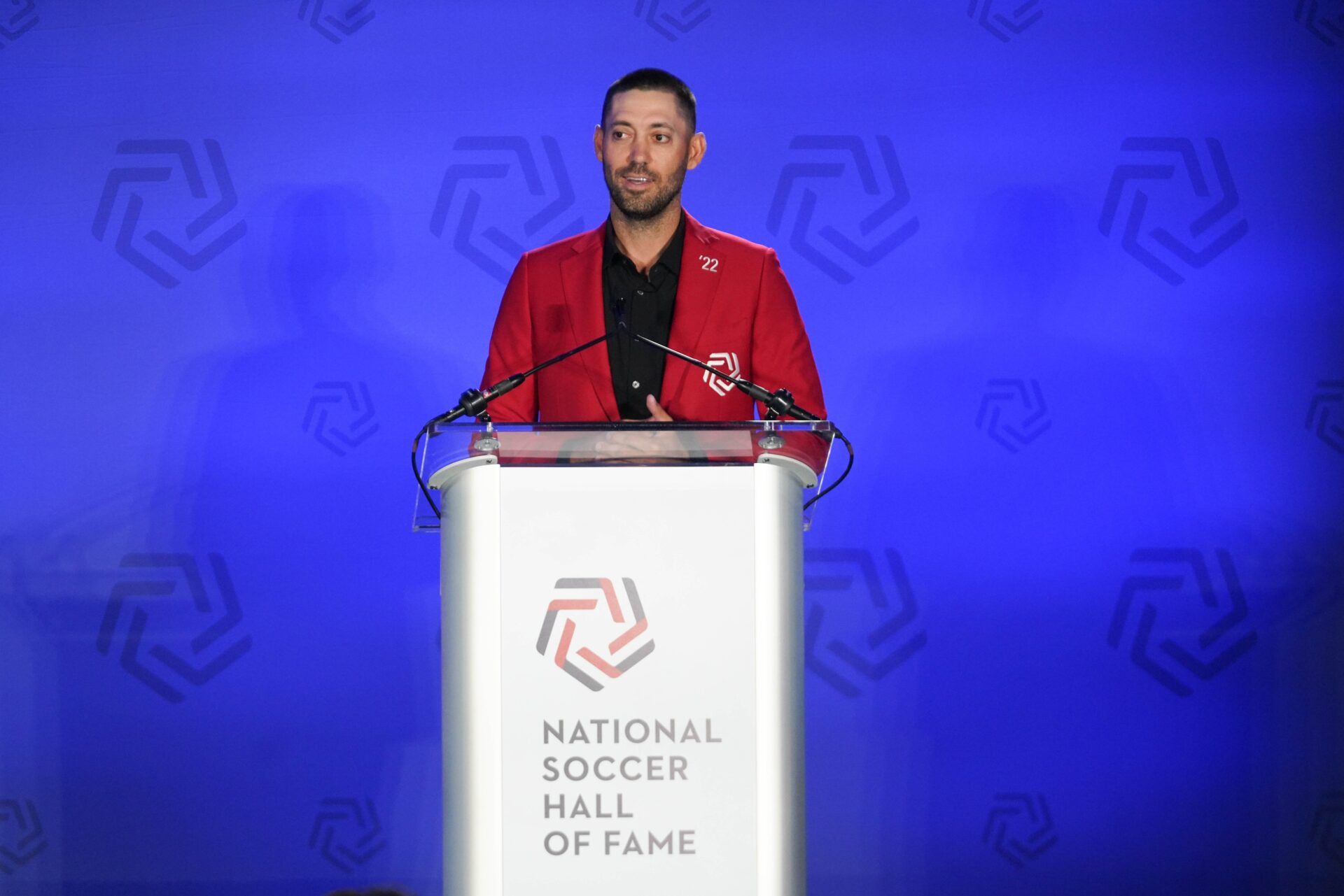 Clint Dempsey addresses the crowd during the National Soccer Hall of Fame Class of 2022 Induction Ceremony at Toyota Stadium.
