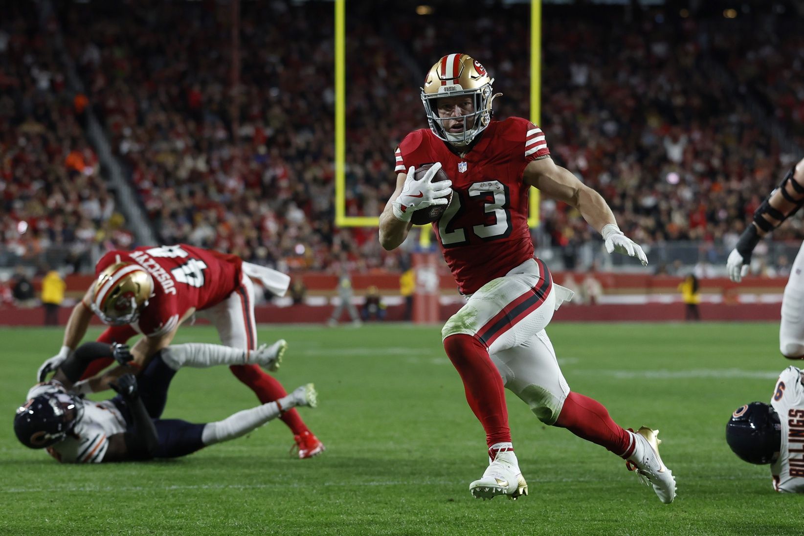 San Francisco 49ers running back Christian McCaffrey (23) runs for a touchdown against the Chicago Bears in the first half at Levi's Stadium